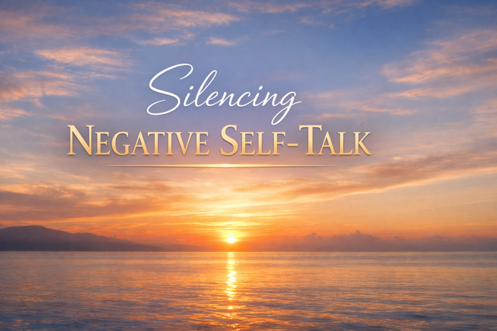 A serene ocean at sunset with golden light reflecting on calm water and the words “Silencing Negative Self‑Talk” in soft white and gold text.